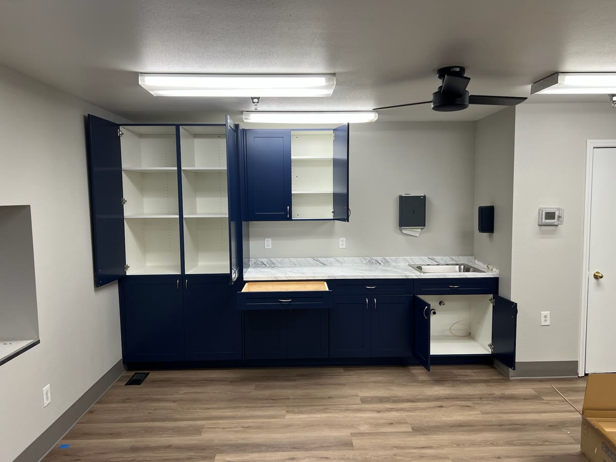 Blue commercial storage casework with adjustable interiors