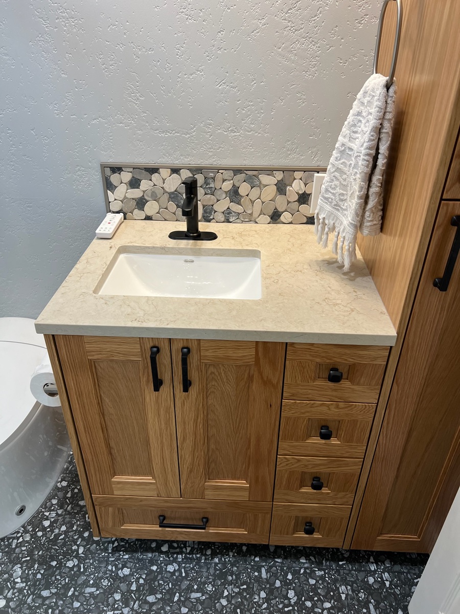 Custom wood vanity with linen tower — Boise, Idaho